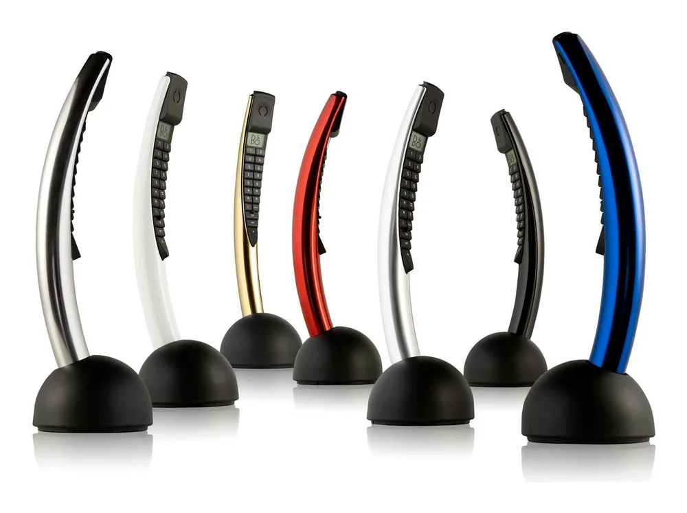 Bang & Olufsen BeoCom 2 handsets in seven colours on their chargers
