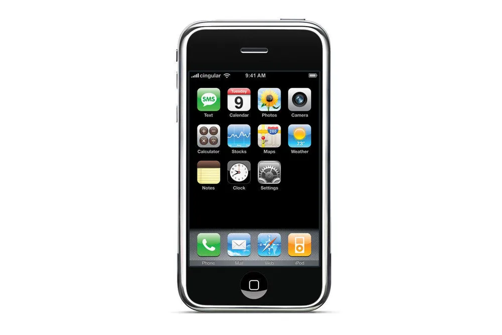 Original 2007 iPhone, straight-on front view with home screen
